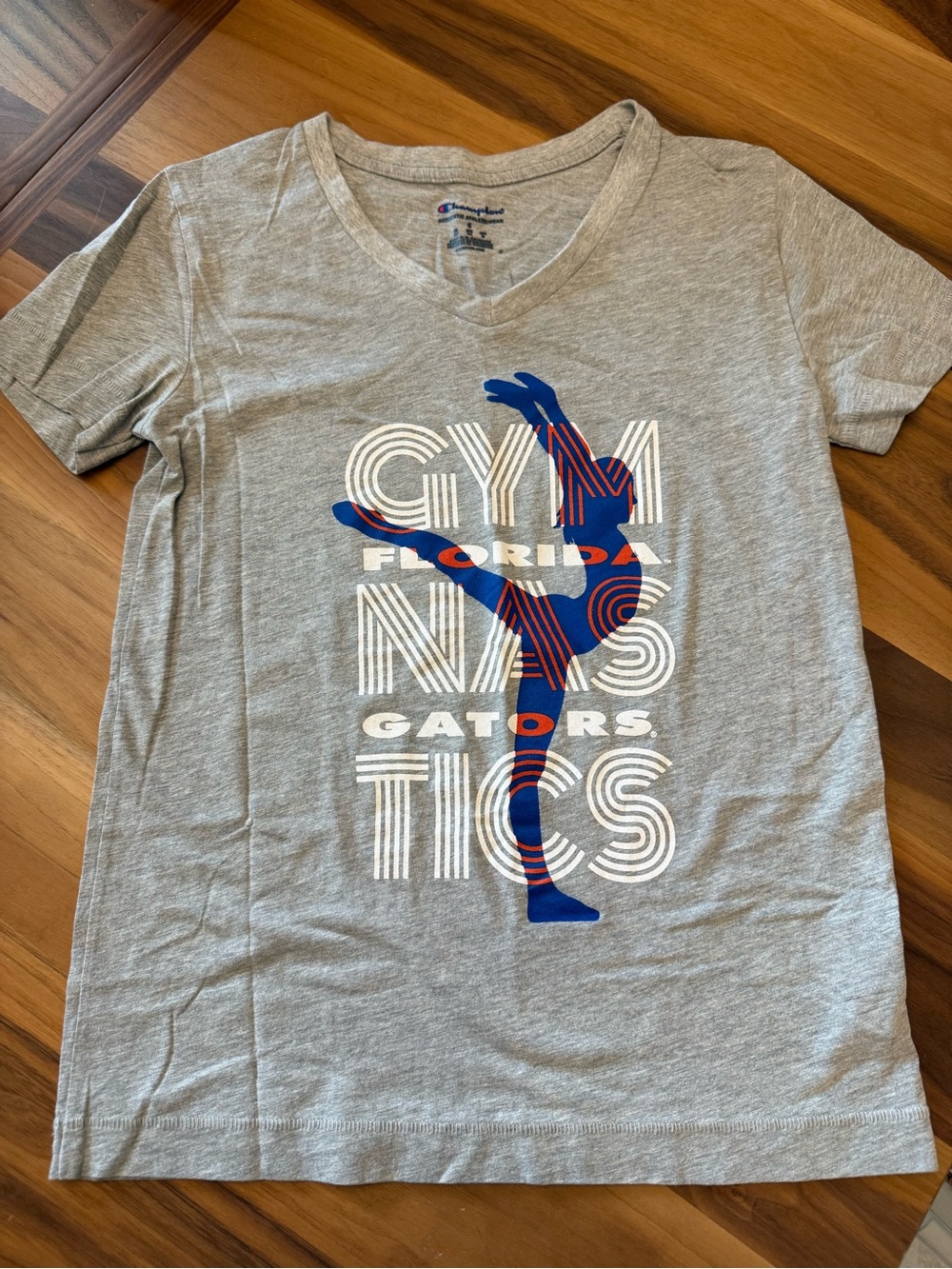 Champion Gray V-Neck Gymnastics Tee with Blue & White Graphic